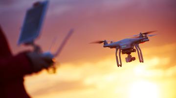 drone pilotage at sunset
