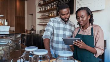 Business owners using a mobile app