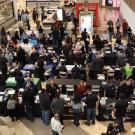 Bird's eye view of job seekers and employers connecting at the 2025 Brea Career Fair