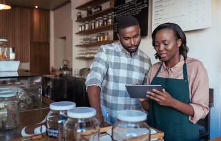 Business owners using a mobile app